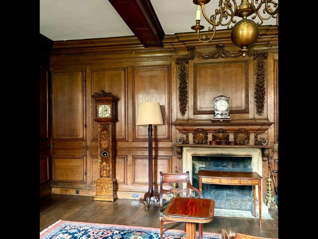Photo of Daniel Quare clock against the back wall in Lower SCR