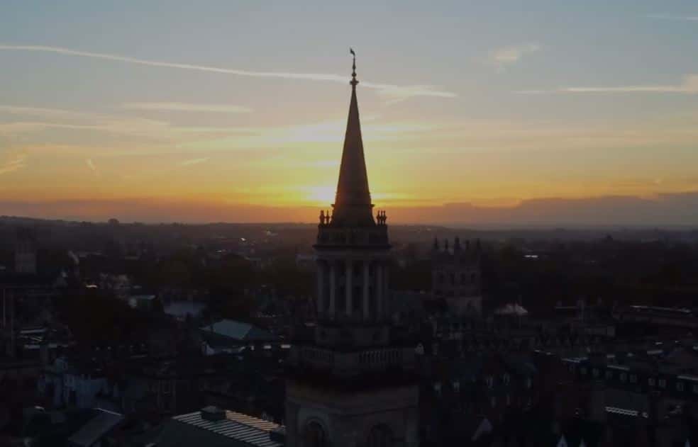 Photo of the library in silouette at sunrise