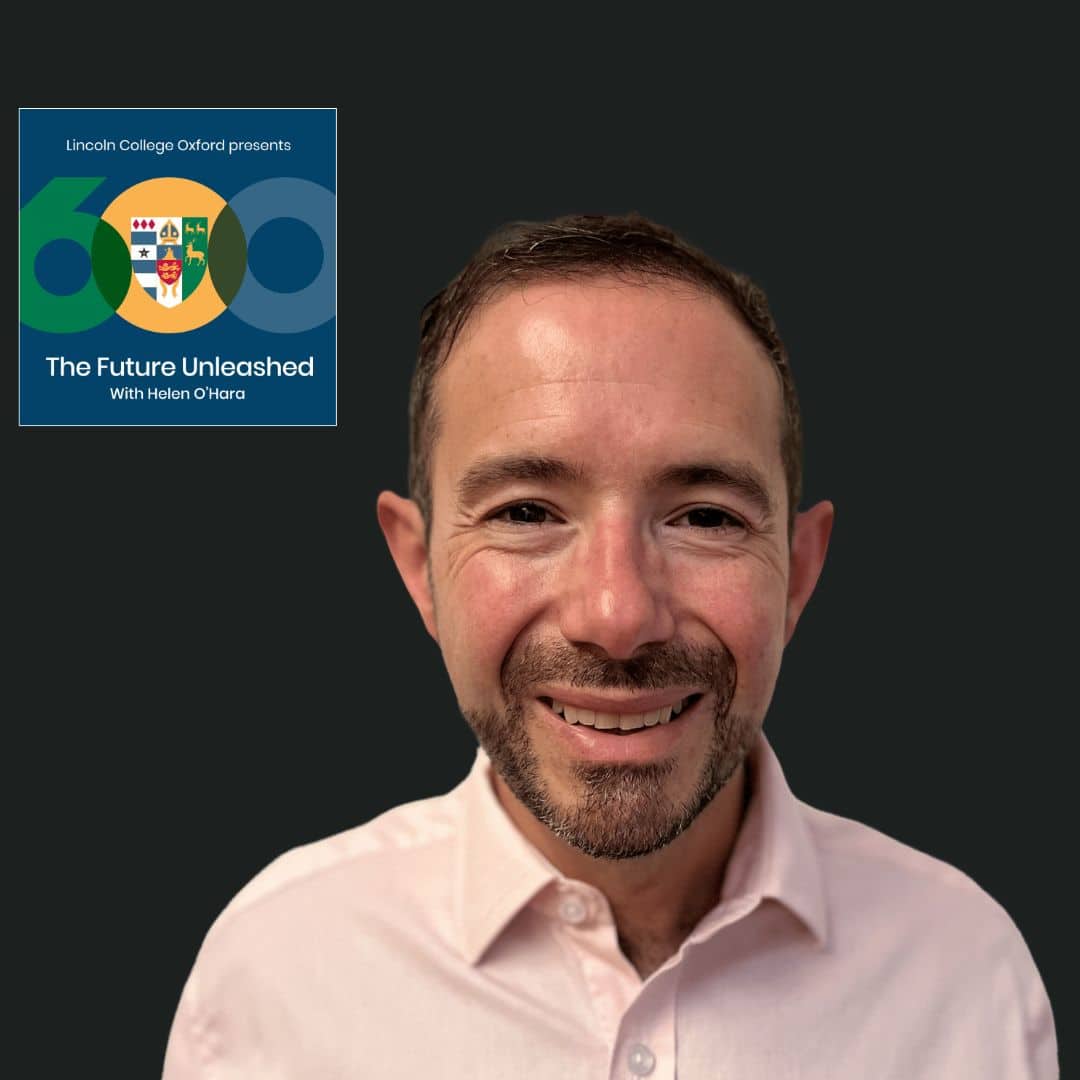 Photo of Adam Camilletti wearing a pale pink shirt against a black background. The podcast logo is in the top left corner.