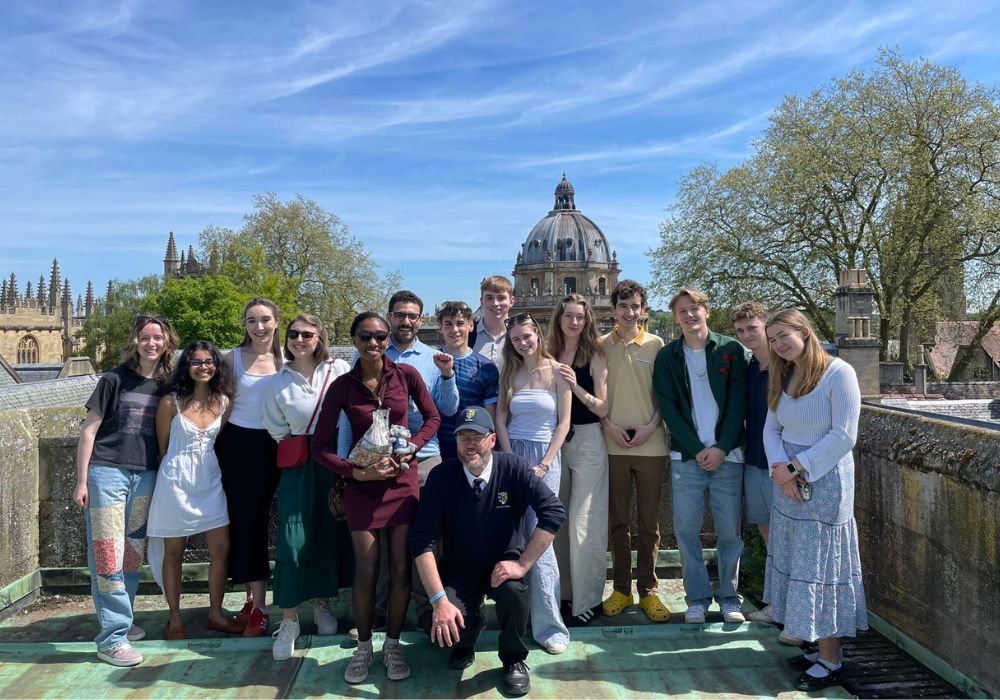 Photo of the Lincoln choir posed on the tower