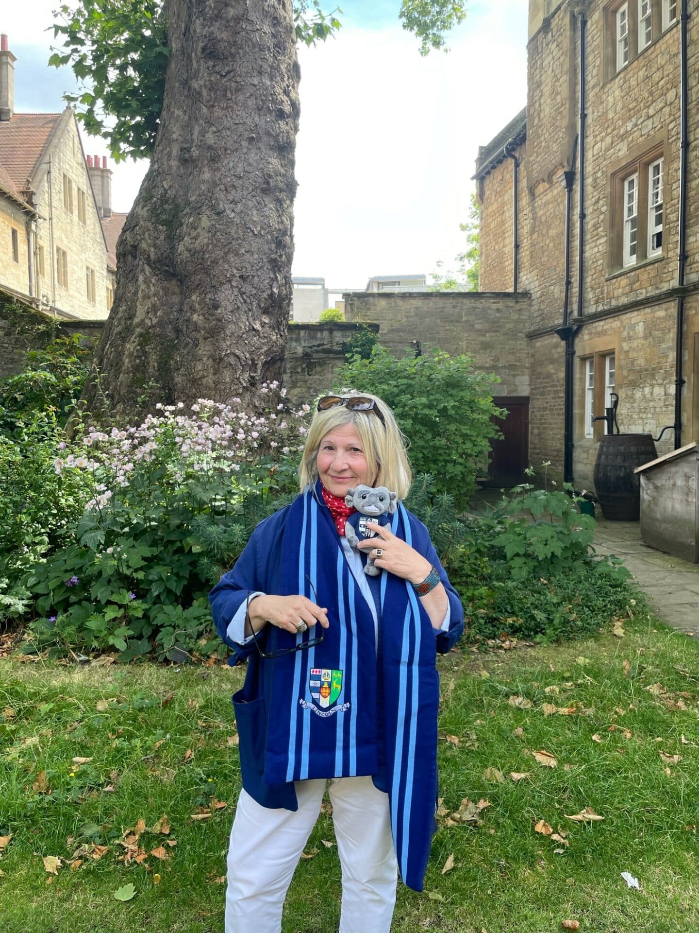 Carmella Elan-Gaston with Lincoln College merchandise