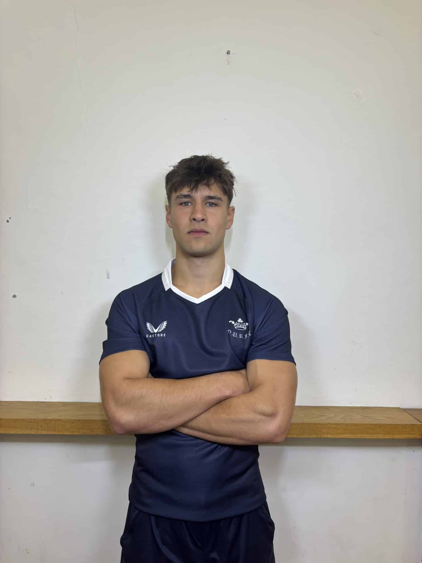 Photo of Harry Bridgewater with arms crossed wearing Blues kit