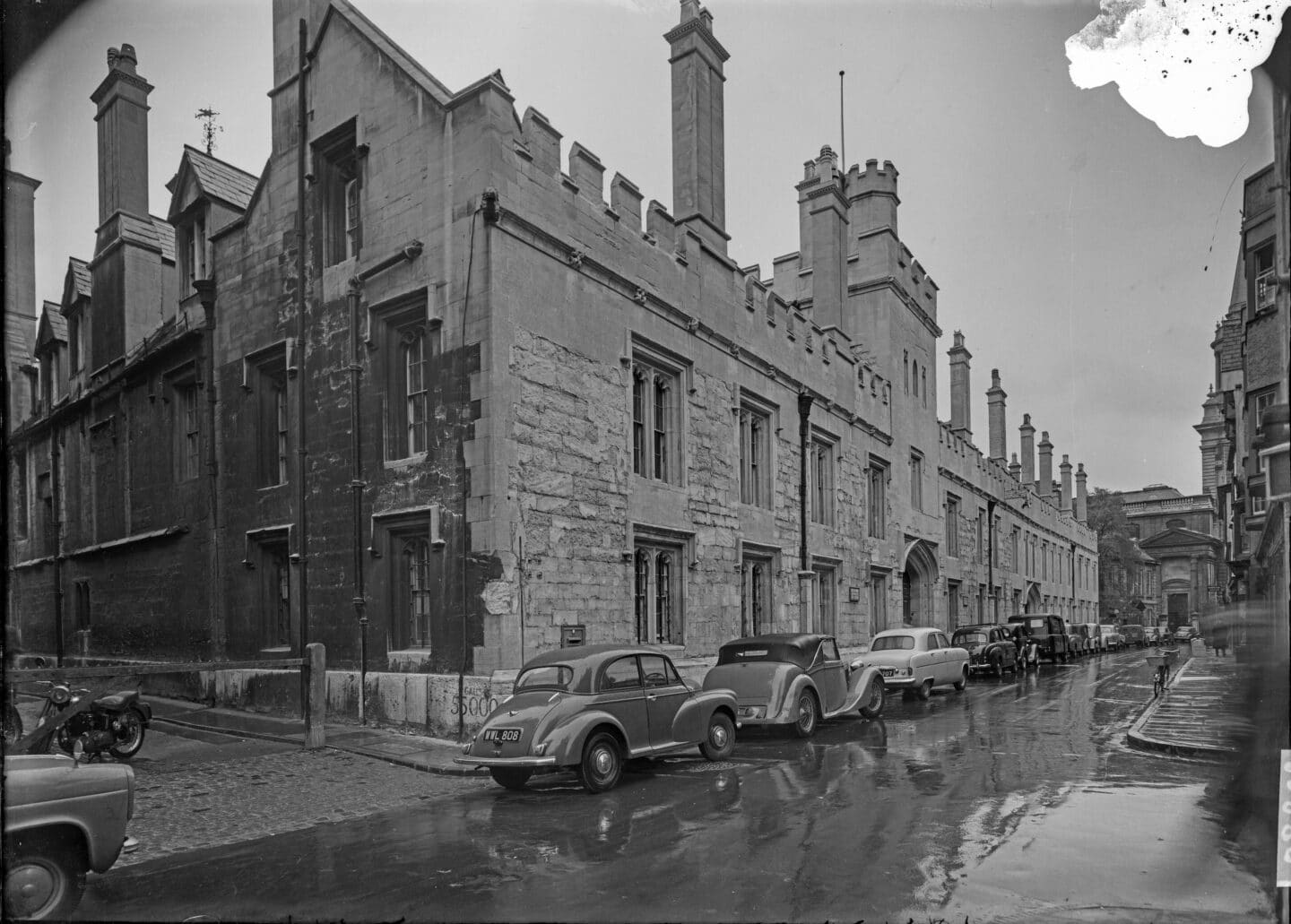 Old greyscale photograph of Lincoln College on Turl Street
