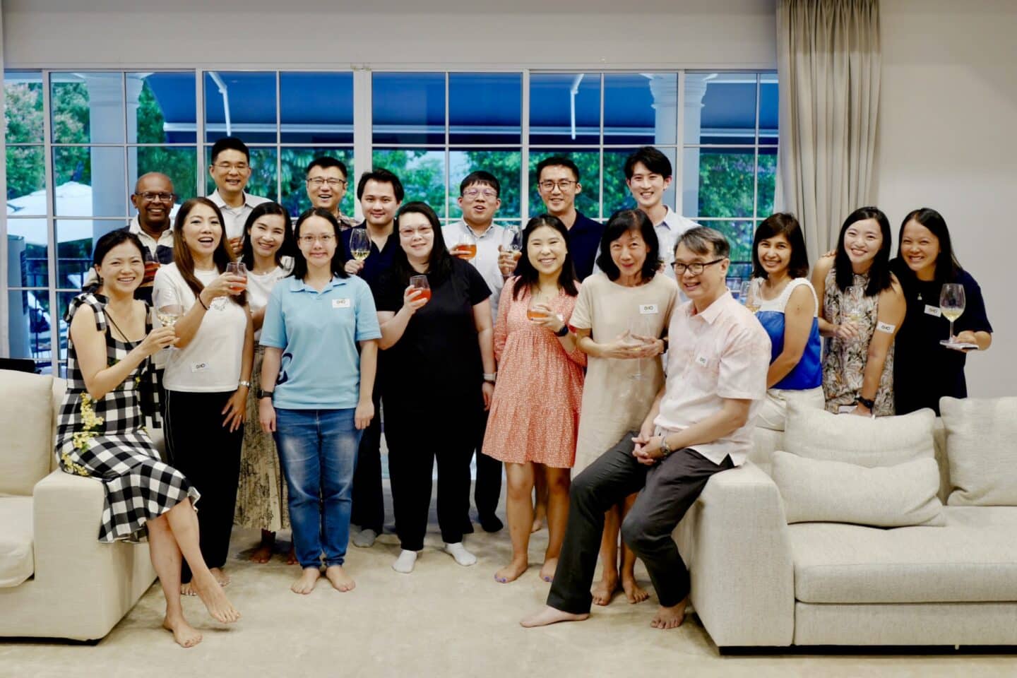 Group of alumni at toasts across the coast Singapore