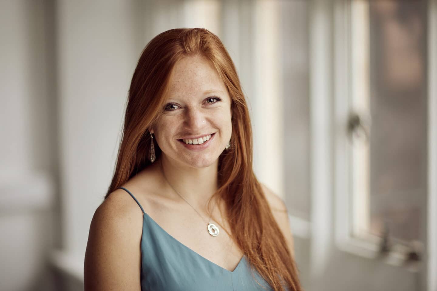 Photo of Emma Walker-Silverman in teal shirt