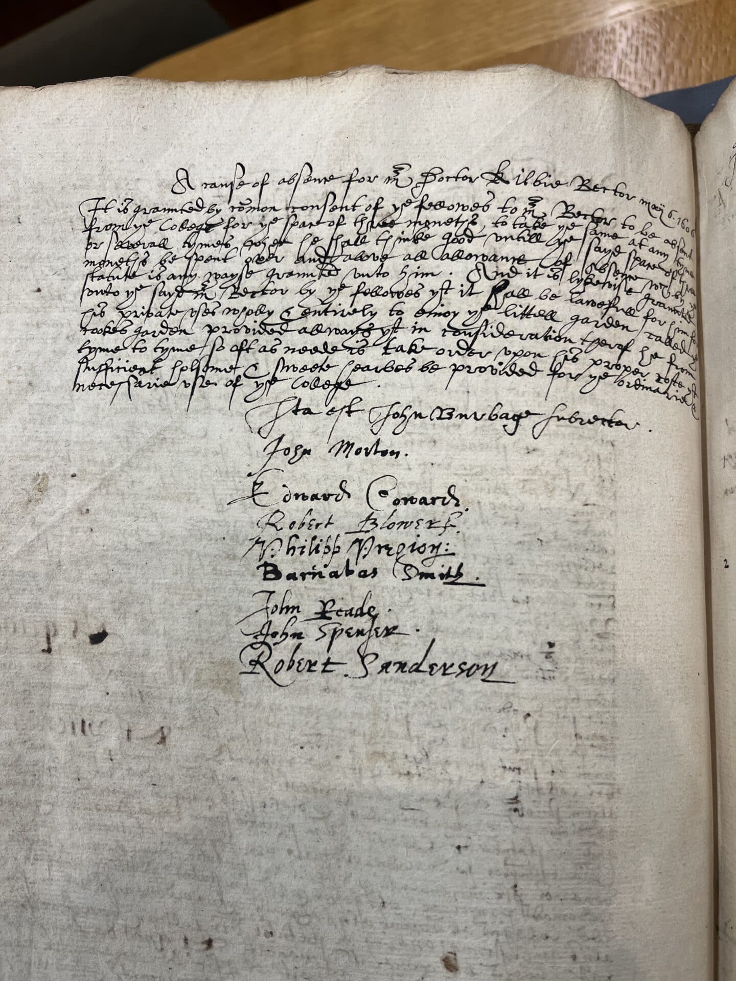 Handwritten College record from 1606 granting Rector Richard Kilbye use of ‘the Grove’ in exchange for supplying wholesome herbs for the College. Includes early modern handwriting and multiple signatories.