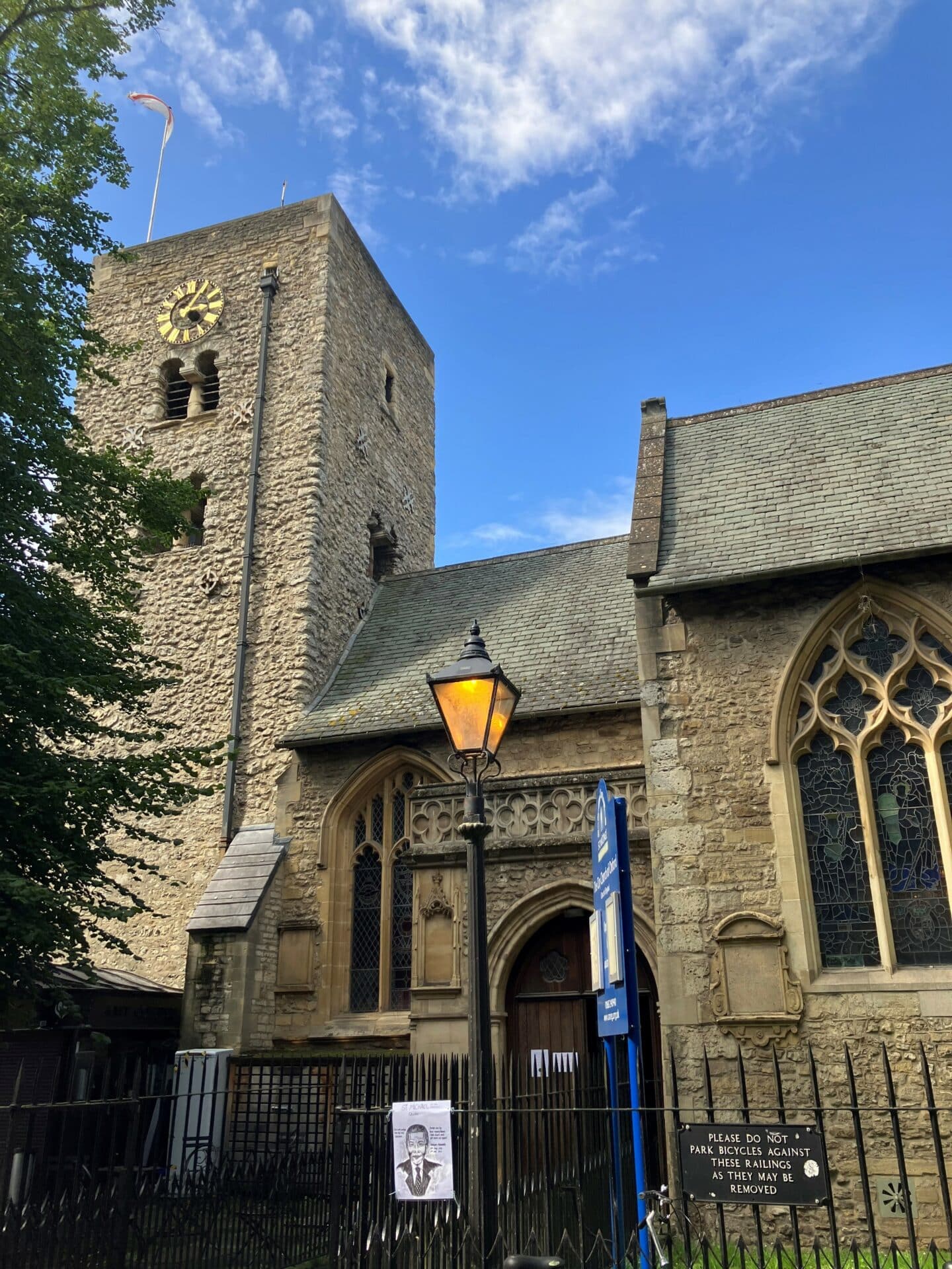 Photo of St Michael at the North Gate Church against a blue sky