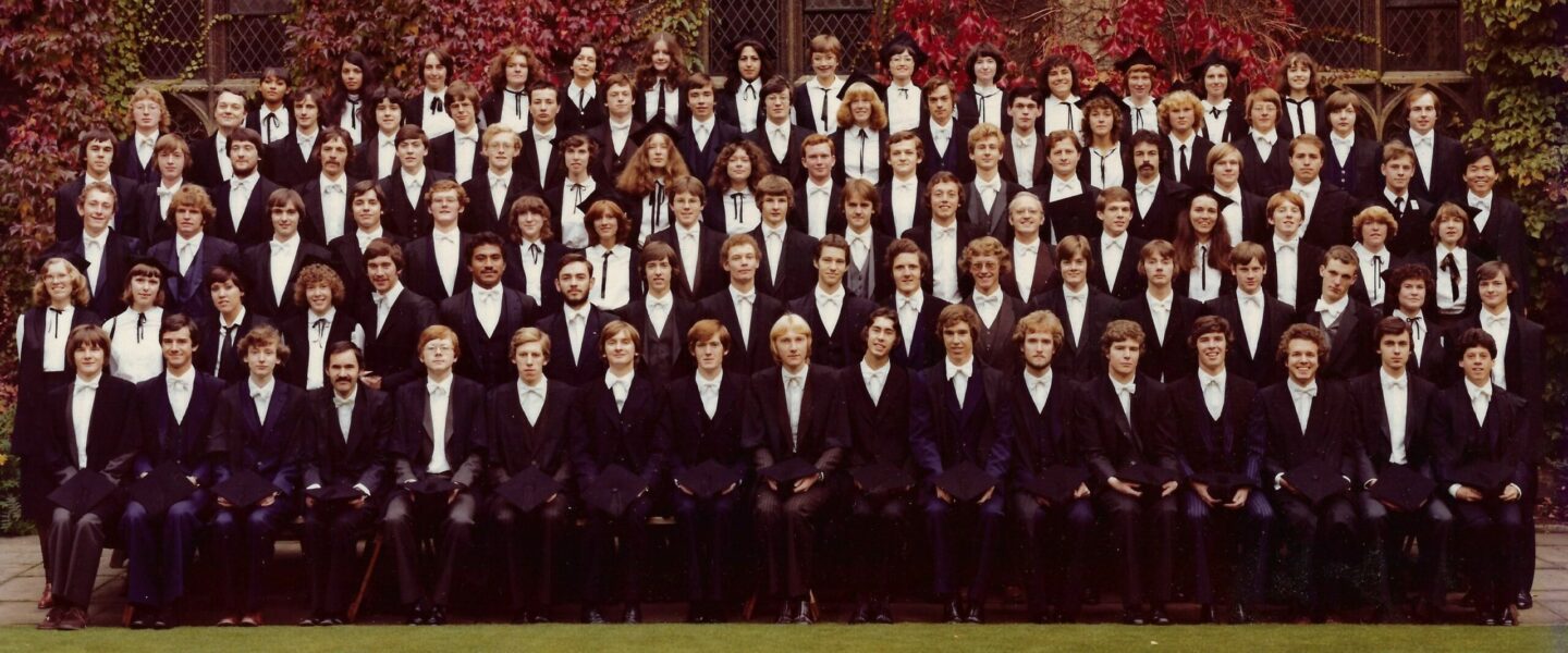Matriculation photograph featuring rows of men and women in black tie in the Front Quad of Lincoln College