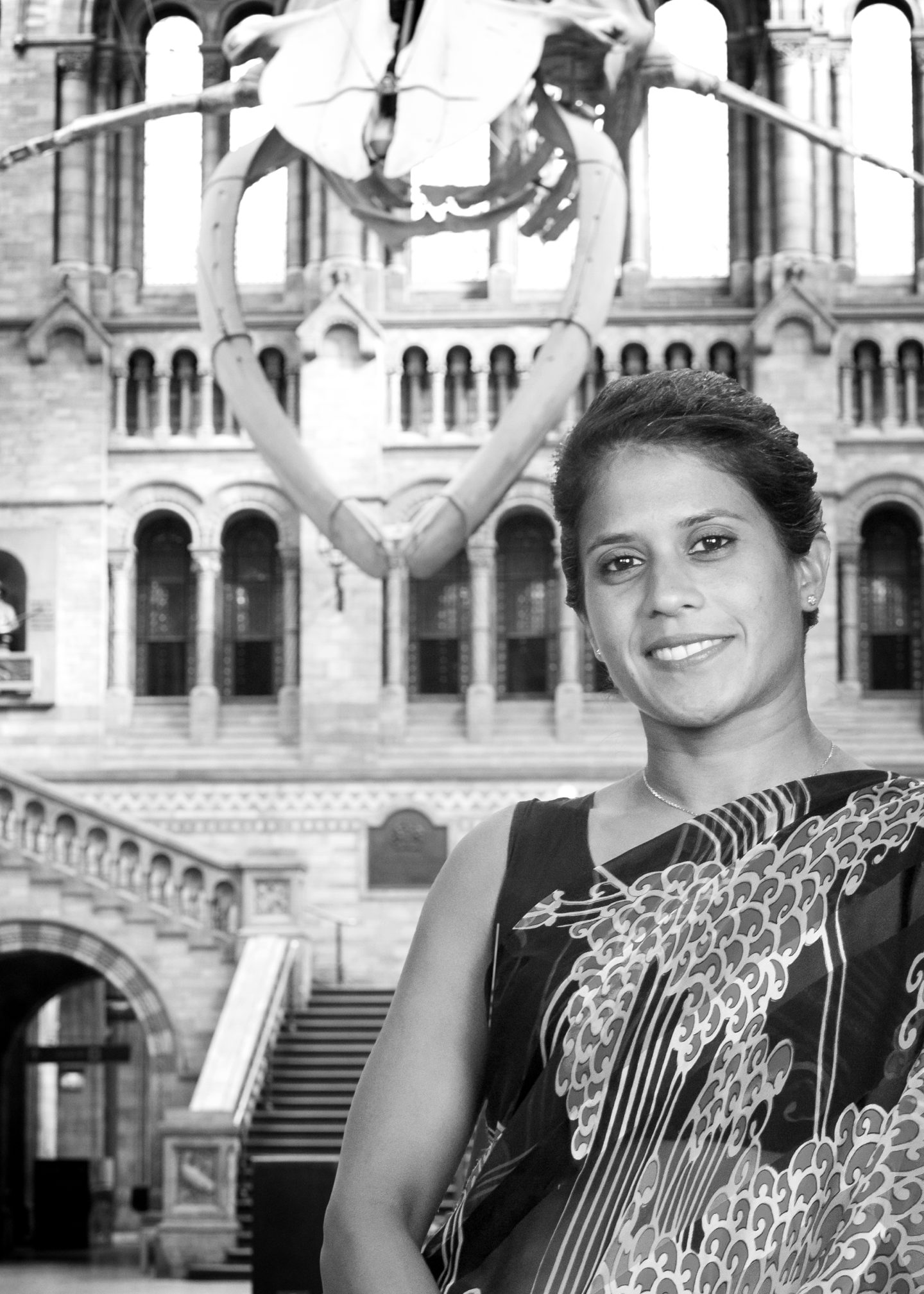 Greyscale photograph of Asha De Vos, a woman in a sari