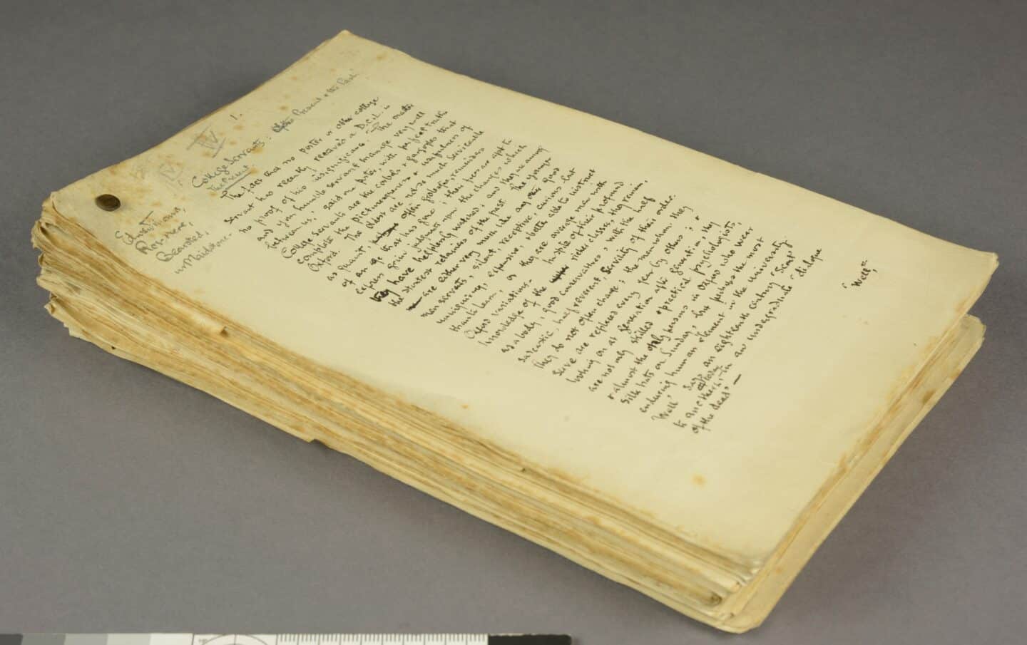 A stack of old papers with handwritten text
