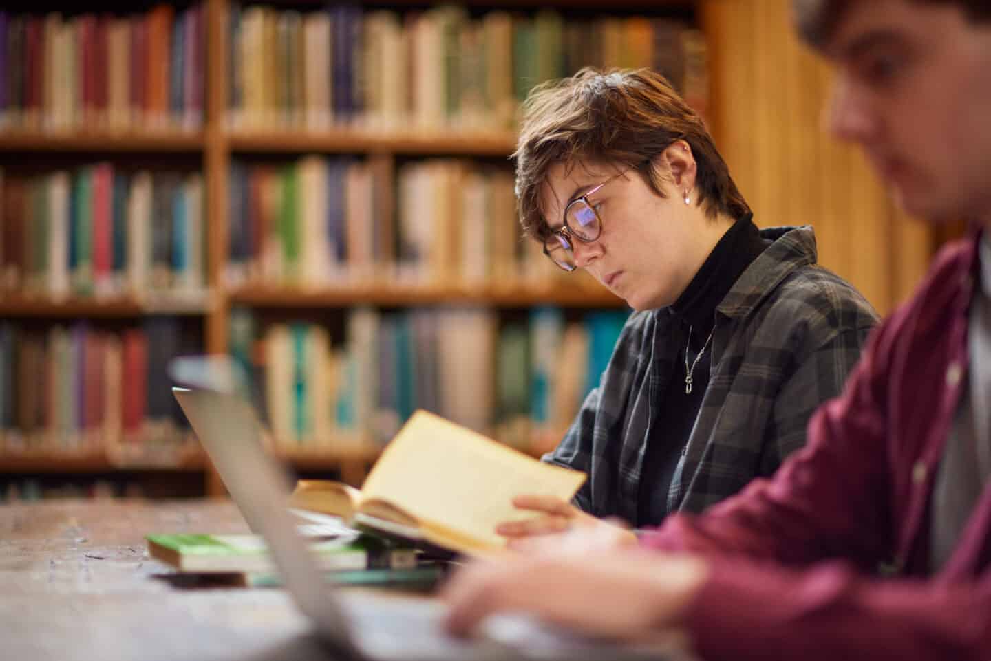 Two students studying in the Lincoln College Library