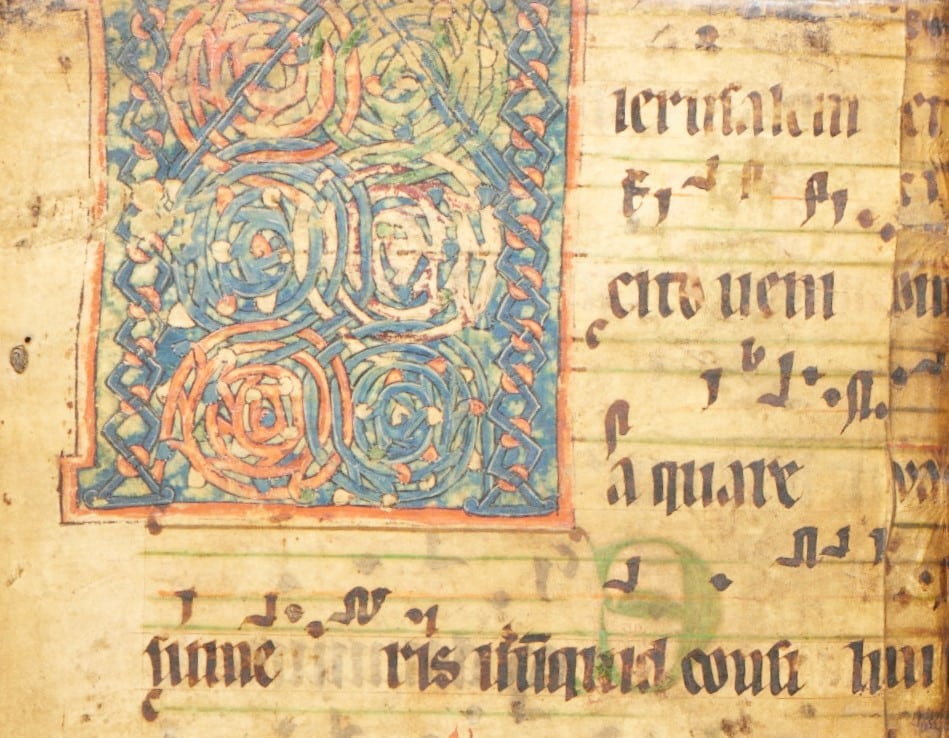 Page from an old manuscript with illustration, text, and some musical annotations