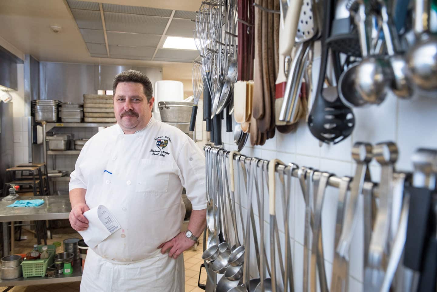 Photograph of the Chef Richard Malloy, in the Lincoln College kitchen