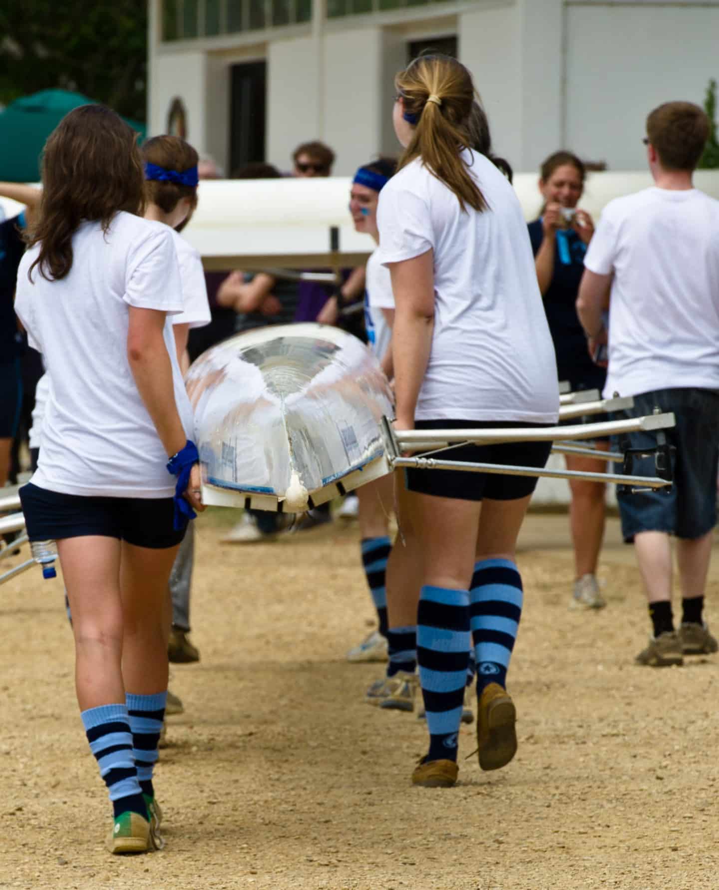 Lincoln College Women's Boat Club carrying their boat