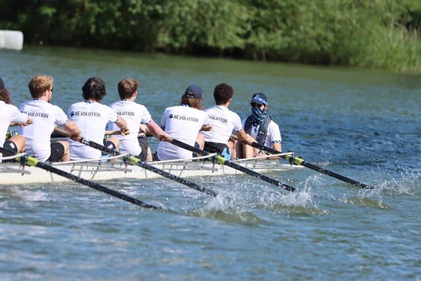 The men's crew on the river.