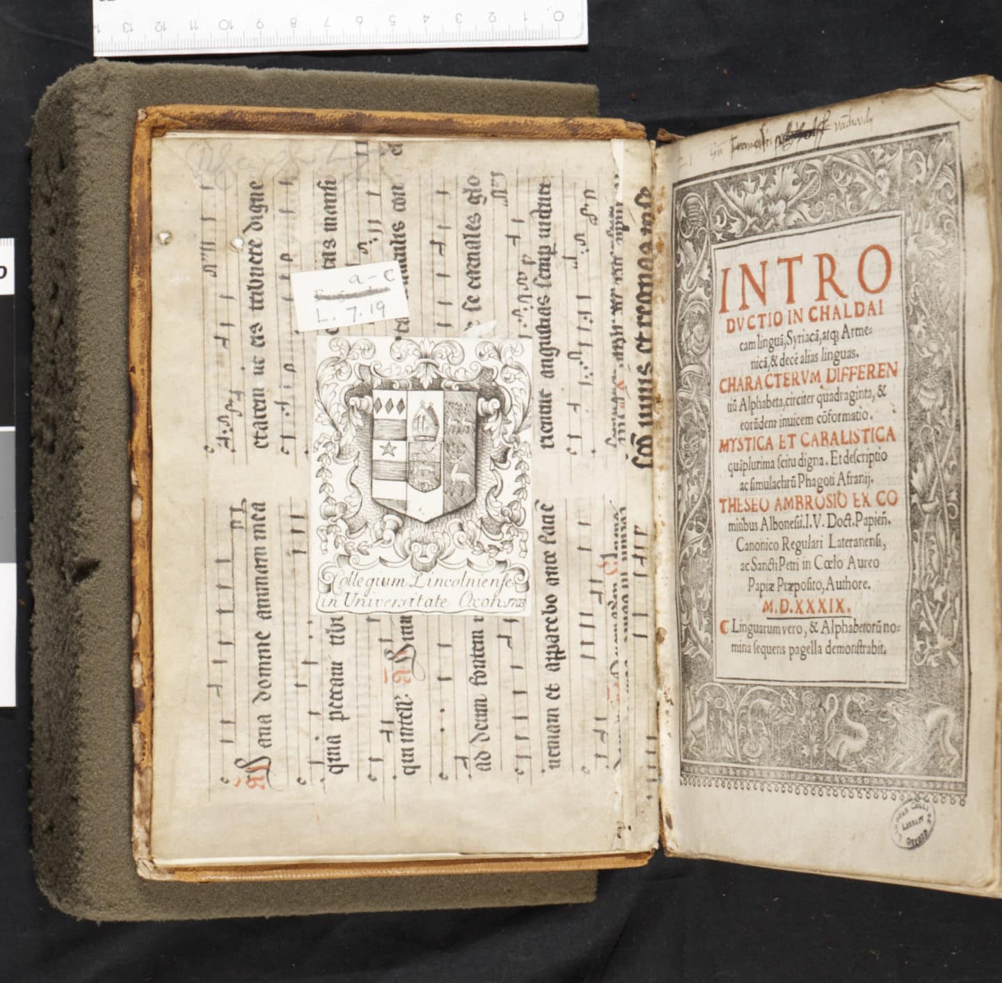 Responsories for the Office of the dead; on parchment, with freely ruled staves and Messine-Gothic neumatic notation. One side of the leaf is not visible because it has been glued to the front board; other leaves of plainchant that were bound in as flyleaves have been trimmed, leaving only stubs. A college book plate has been pasted over the music notation.